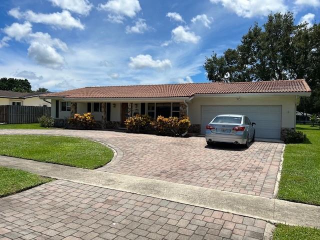 BIG BEAUTIFUL OPEN SPACIOUS 4 BEDROOM 2 BATH HOME IN THE HEART OF PLANTATION. IMPACT WINDOWS. HUGE SCREENED TILED PATIO AND OPEN PATIO OVERLOOKING A MASSIVE BACKYARD AND TRANQUIL WATER VIEW. GREAT YARD FOR PETS, BBQS, AND ENTERTAINING. LARGE ORGINAL KITCHEN WITH SNACK BAR OPENS TO A HUGE FAMILYROOM, GREAT FLOOR PLAN. WASHER/DRYER NEW 2025. NO HOA. AWESOME AREA. CLOSE TO PARKS, SHOPPING, RESTURANTS, SCHOOLS, MAJOR ROADWAYS AND MORE.