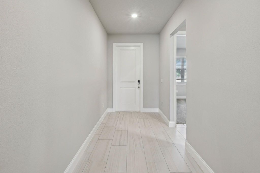 Photo of 6304 NW Cloverdale Avenue, Port Saint Lucie, FL 34987 (MLS # R11120455)