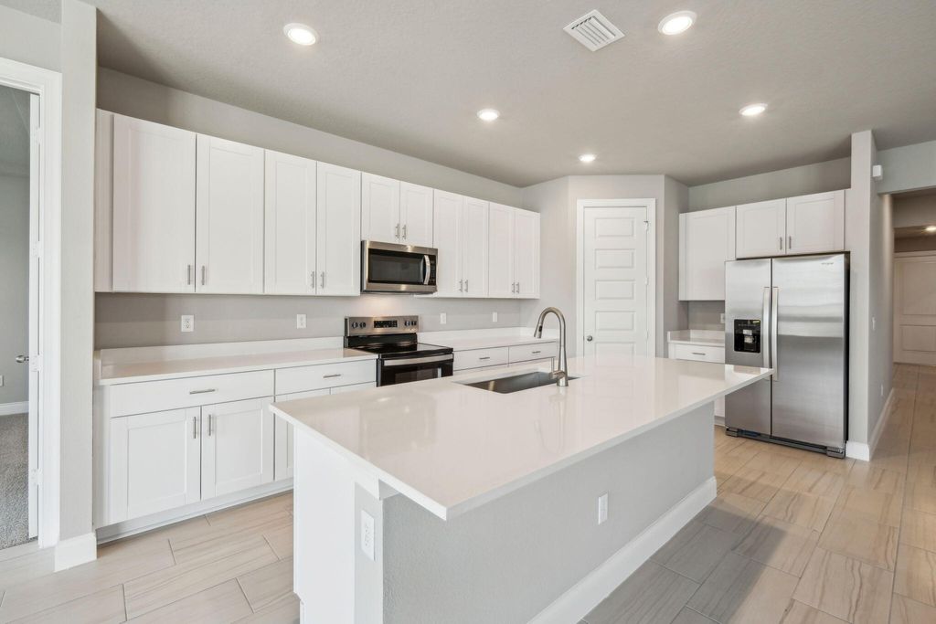 Photo of 6304 NW Cloverdale Avenue, Port Saint Lucie, FL 34987 (MLS # R11120455)