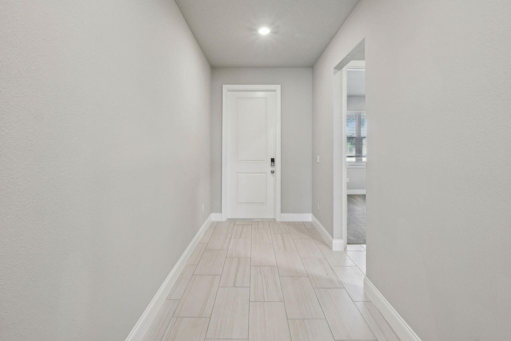 Photo of 6304 NW Cloverdale Avenue, Port Saint Lucie, FL 34987 (MLS # R11120455)