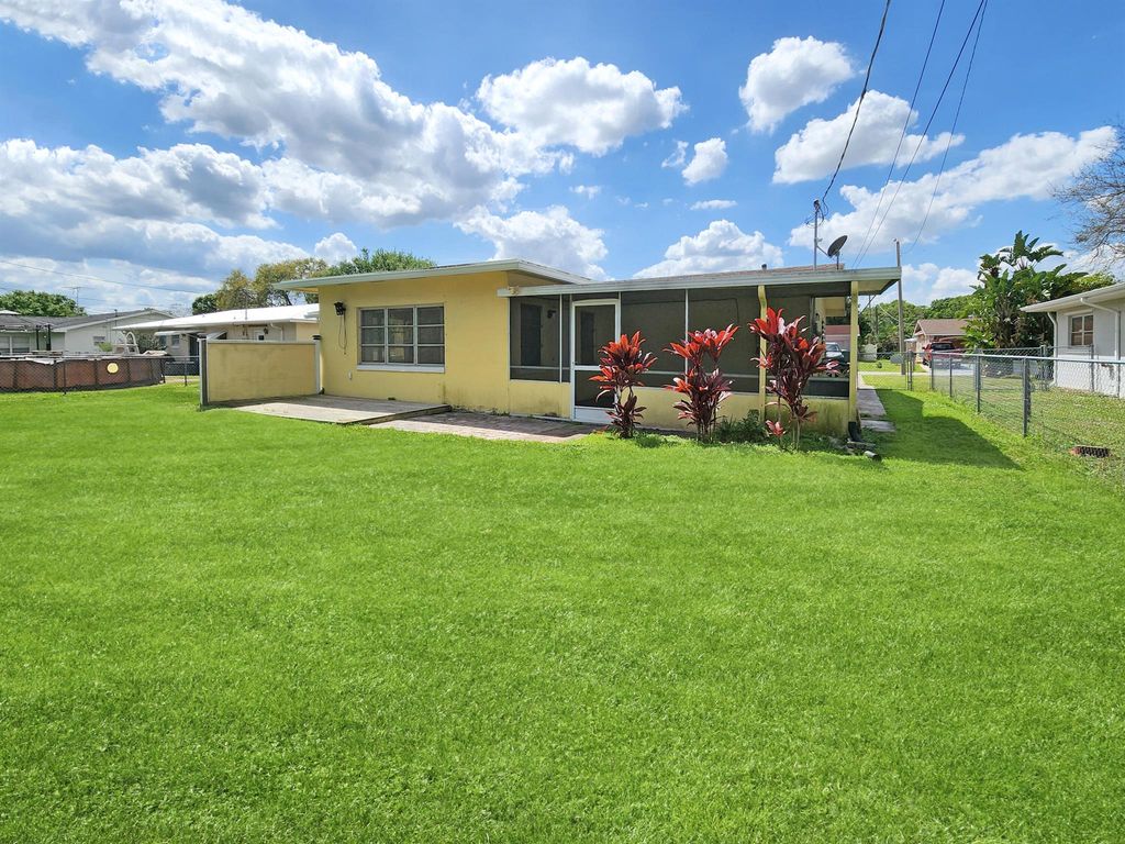 Photo of 217 E Arbor Avenue, Port Saint Lucie, FL 34952 (MLS # R10968550)