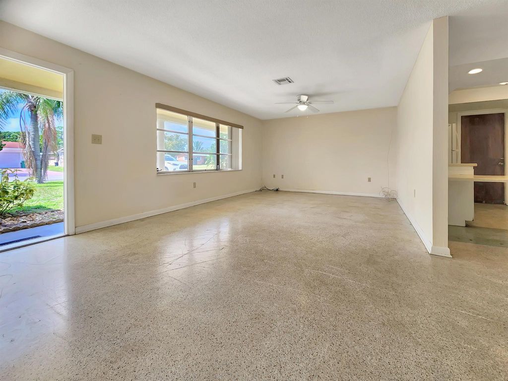 Photo of 217 E Arbor Avenue, Port Saint Lucie, FL 34952 (MLS # R10968550)