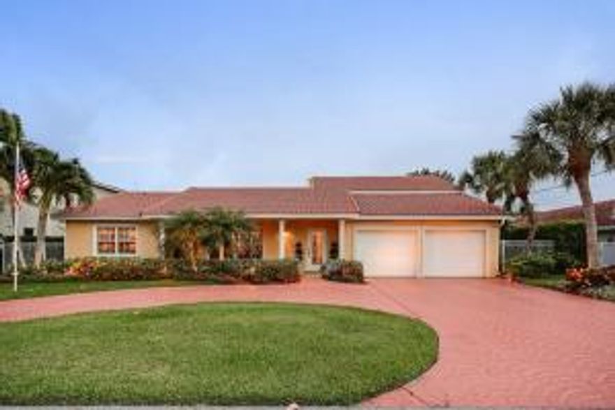 Bring your 90ft Yacht to this South facing in the rear on one of Boca widest and deepest canals. Totally redone in everyway , impact glass, garage doors and front door impact rated , new roof,new a/c, new pool salt water  and kitchen.  Everything you need for your Boca waterfront lifestyle.