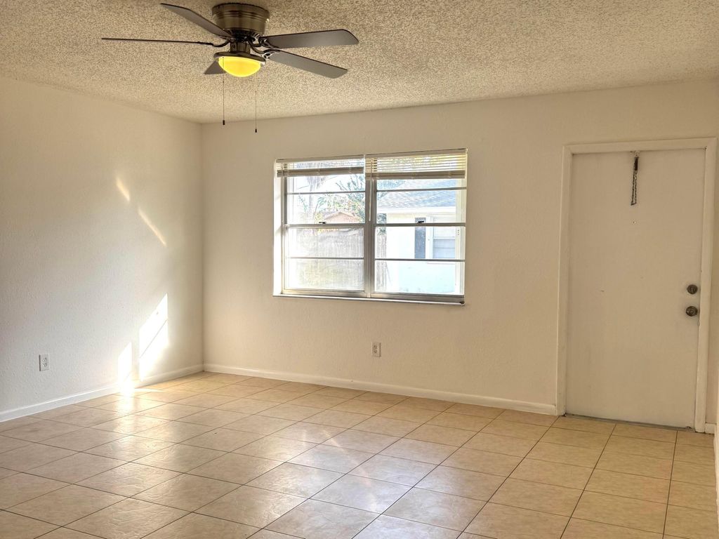 Photo of 3072 Martin Avenue, Greenacres, FL 33463 (MLS # R11164898)