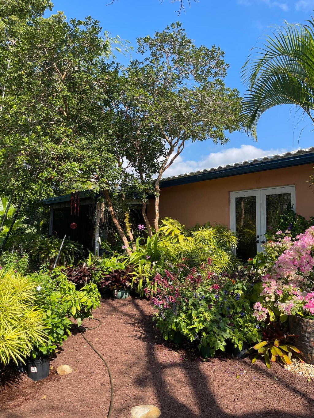 Photo of 445 NW 8th Street, Boca Raton, FL 33432 (MLS # B26077109)