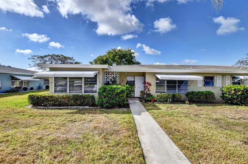 Photo of 230 High Point Court E #Apt A, Delray Beach, FL 33445 (MLS # R10876594)