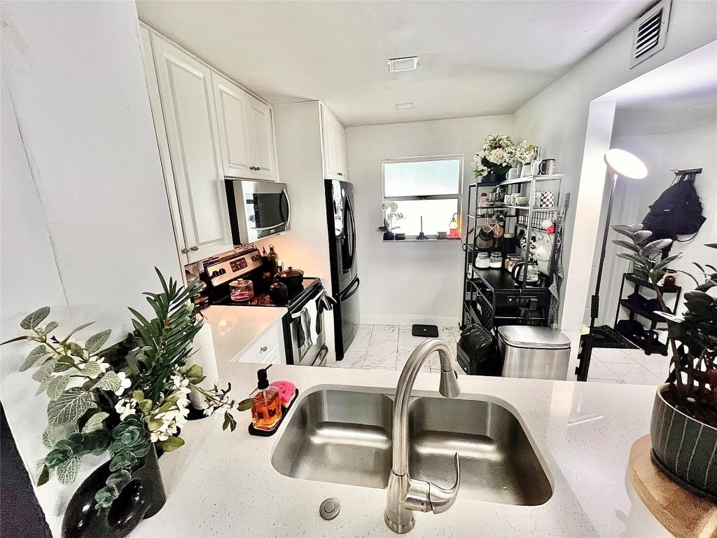 Photo of 8301 Sands Point Boulevard #306s, Tamarac, FL 33321 (MLS # B26057234)
