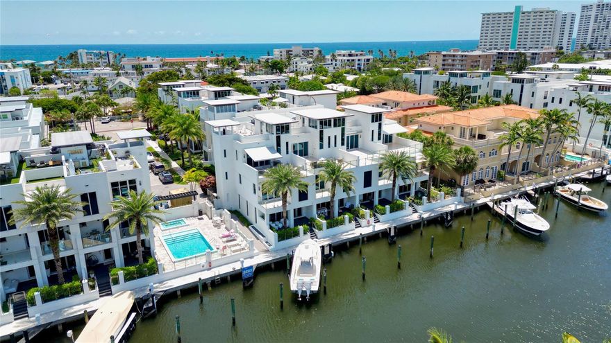 Coastal charm meets elevated elegance at this four-level, modern townhouse in the beach town of Lauderdale-by-the-Sea. With 3 spacious bedrooms and 3.5 baths, this like-new residence offers stylish living across three interior levels, plus a private rooftop terrace with 360° views. The ground floor features a 2-car garage with custom storage, entry courtyard, and en-suite bedroom/office. A floating staircase leads to a designer kitchen, pantry, laundry, spacious living area, terrace, powder room, and second bedroom with full bath. The third-floor primary suite stuns with dual walk-ins, soaking tub, and luxe shower. Private elevator, community pool, hydro-spa, and boat slips (as available). Walk to beach, dining, shops. Unmatched value. Unit comes fully furnished with indoor / outdoor furniture by Artefacto, Mooi lighting fixtures, top of the line Wolf appliances (including built-in coffee maker), automatic window treatments, Control 4 sound and lighting system. Sale excludes artwork, personal effects, and accessories.The Ground Level features a two-car garage with custom built-ins for tidy storage leading into an airy entry courtyard facing foyer and en-suite secondary bedroom / office.Connected by a finely cladded floating staircase, the stunning 2nd Level features a showroom quality kitchen, pantry and laundry room which flow directly into the spacious living room and adjoining terrace, allowing you to fully appreciate the impressive length of the property with seamless indoor/outdoor lifestyle. Also on this level, one can enjoy an upgraded powder room, secondary bedroom, and adjacent full-bathroom.More like its own apartment among the treetops, the primary suite encompasses the entire 3rd Level with seating area, two walk-in closets, soaking tub, double vanities, and a shower fit for a king, queen, or party.The rooftop makes for the perfect private terrace with 360° treetop, city, and ocean views. Ideal for entertaining, all levels are accessible via elevator with an upgraded cabin.Community amenities include a waterfront pool, hydro-spa, guest parking, and boat slips (pending availability). Walk to restaurants, bars, shops, and the beach in minutes. Easy drive to multiple airports and all of what Greater Fort Lauderdale has to offer.Don't miss out on this incredible opportunity for the best priced, water accessible, like-new, beach townhouse -- simply the greatest value in the region.