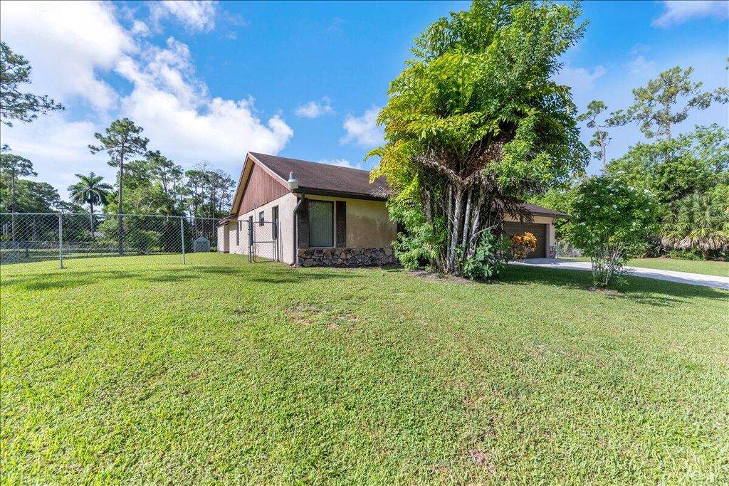 Photo of 11952 60th Street N, The Acreage, FL 33411 (MLS # R11152492)
