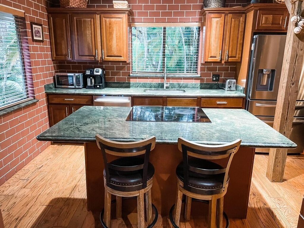 Photo of 25 Lexington Lane W #Unit E, Palm Beach Gardens, FL 33418 (MLS # R10958743)