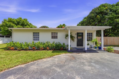 Photo of 1900 Carissa Road, Lake Clarke Shores, FL 33406 (MLS # B26050752)