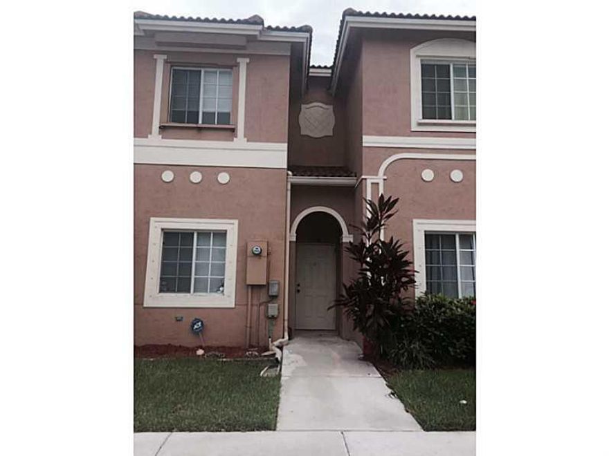 WOW! BACK ON MARKET!! Jackpot for the quick buyer!! Just beautiful with the most serene, relaxing lake views in all of  community. Newer SS appl, storm shutters thru out, W/D upstairs for your convenience. No rental restrictions, dogs over 25lbs welcome.  Knockdown walls & ceilings, upgraded security system includes outdoor cameras. Enjoy pool & playground & walk to Tamarac Sports Complex. Pool area just had a huge redo with new marcite , lounge chairs, etc. See Broker Remarks