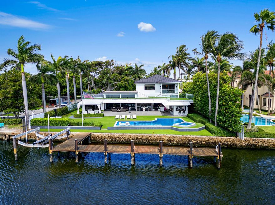 A unique waterfront opportunity awaits -- build a new 20,000-square-foot estate or enjoy as is! On nearly a half-acre on a corner parcel with 103+/- feet of wide direct Intracoastal Waterway frontage, astute owners can create the mansion of their dreams with a versatile floor plan tailored to fit their needs and superb yacht dockage in one of Delray Beach's most desirable neighborhoods.