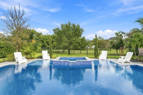 Photo of 1050 Sweetgrass Street, Loxahatchee, FL 33470 (MLS # B26090905)