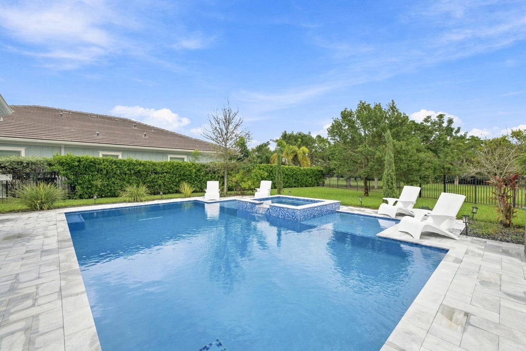 Photo of 1050 Sweetgrass Street, Loxahatchee, FL 33470 (MLS # B26090905)