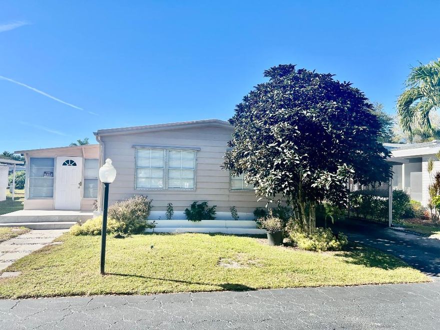 LOCATION, LOCATION, LOCATION! DON'T MISS THIS OPPORTUNITY. THIS IS A 2/2 LOCATED IN A 55+ GATED COMMUNITY. TOTALLY REMODELED: NEW FLOOR, NEW WALLS, NEW ELECTRICAL SYSTEM, NEW A/C. THE KITCHEN IS OPEN THROUGH WITH A LARGE GRANITE COUNTER TOP THAT CAN BE SEATED 12 PEOPLE, NEW STAINLESS STEEL APPLIANCES. CUSTOMER'S MADE CABINETS THROUGHOUT THE HOUSE. THE LOT RENTAL IS $1,160.00 PER MONTH WHICH INCLUDES TRASH REMOVAL, WATER, LANDSCAPING,TAXES AND PEST CONTROL. THE CLUB HOUSE OFFERS LOTS OF ACTIVITIES AND CLOSED TO ALL MAJOR HIGHWAYS, HOSPITALS, SHOPPING, AND RESTAURANTS,