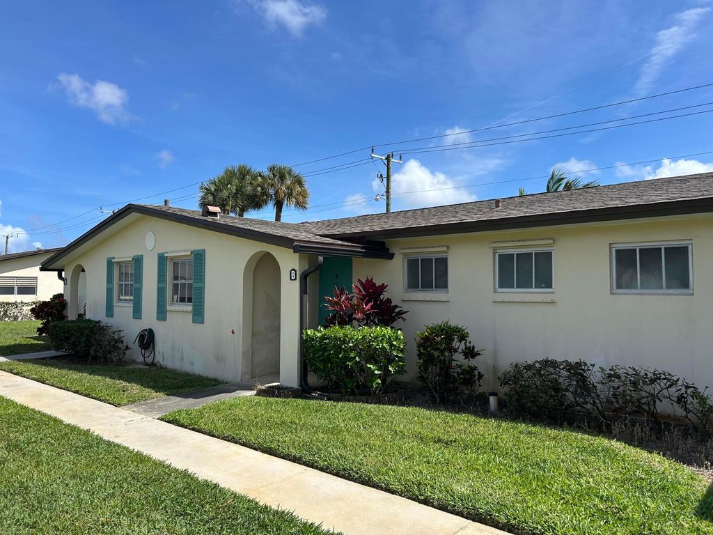Photo of 2971 W Ashley Dr Drive W #B, West Palm Beach, FL 33415 (MLS # B26011859)