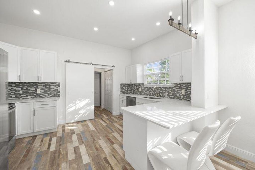 Photo of 331 NW 1st Avenue, Boynton Beach, FL 33435 (MLS # R11100372)