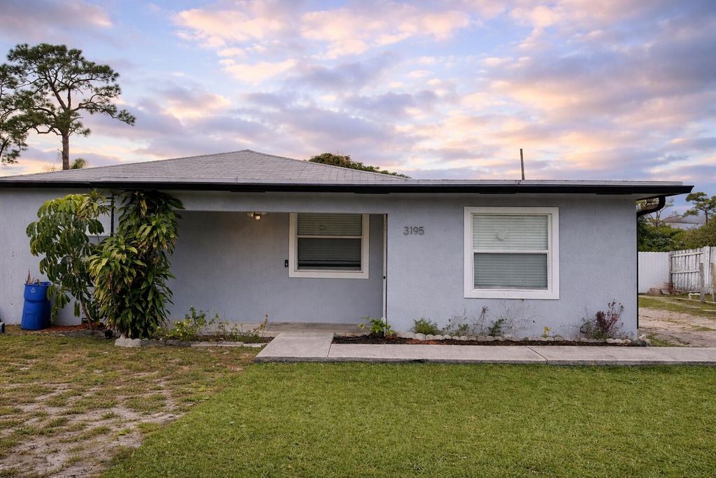 Photo of 3195 Reo Lane, Palm Springs, FL 33461 (MLS # B26011124)