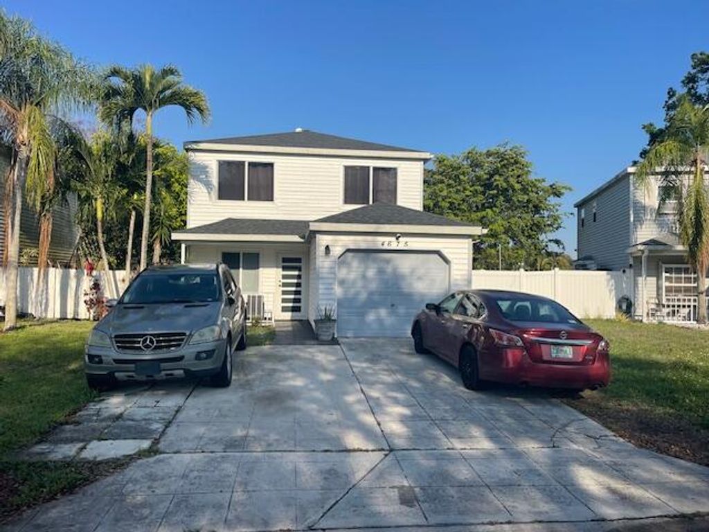 Photo of 4675 Lakeside Circle, West Palm Beach, FL 33417 (MLS # B26006772)