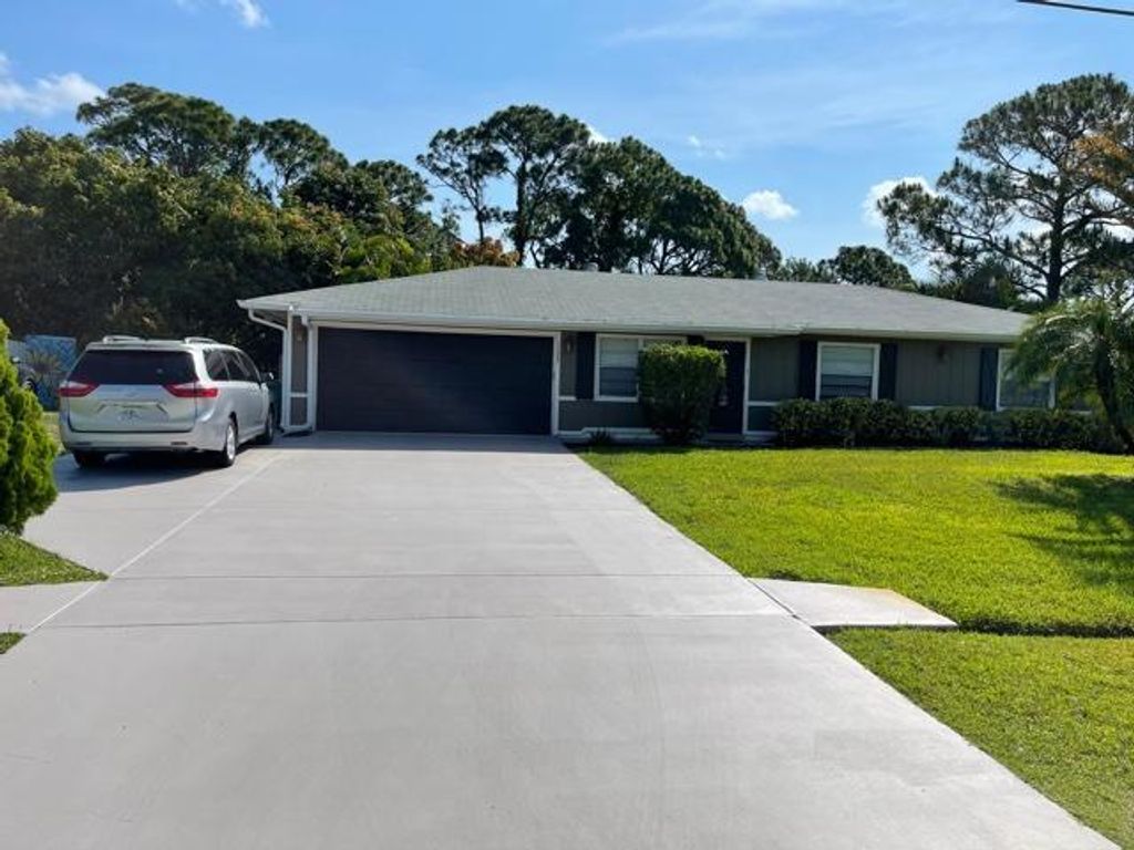 Photo of 1125 SE Odonnell Lane, Port Saint Lucie, FL 34983 (MLS # R10720025)