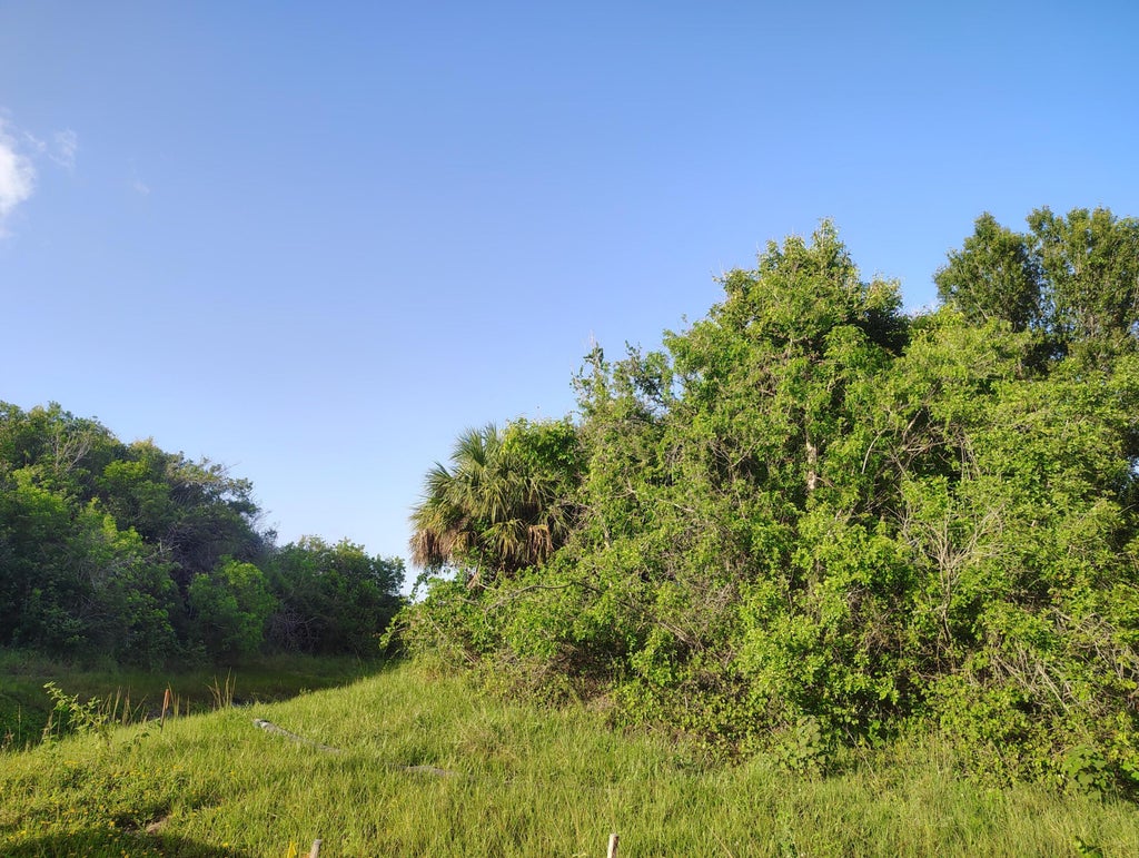 Photo of 3921 SW Port Saint Lucie Boulevard, Port Saint Lucie, FL 34953 (MLS # B26046485)