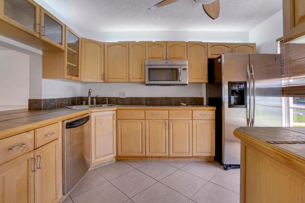 Photo of 3709 Savoy Lane #B, West Palm Beach, FL 33417 (MLS # R11014477)