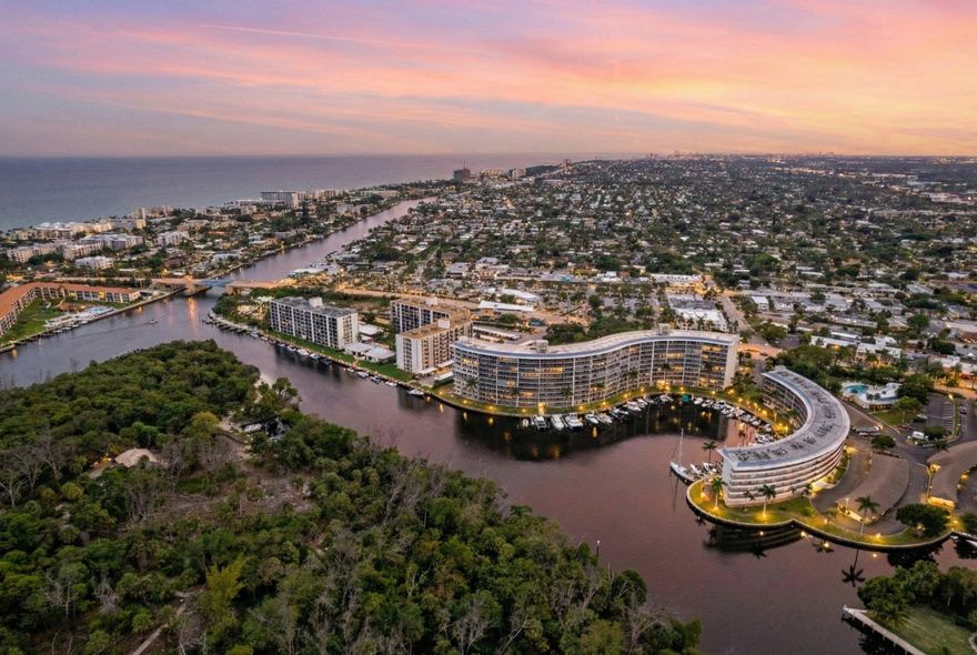 ABSOLUTELY GORGEOUS WATERFONT CONDO | PRESTIGIOUS 55+ HILLSBORO COVE | BREATHTAKING INTRACOASTAL VIEWS | CORNER UNIT | Bright Natural Light | Open Floor Plan | Porcelain Floors | LED Recess & Custom Lighting | Breakfast Bar | Quartz Countertops | Under Counter Lighting | Pantry | Wet Bar & Wine Fridge | Large Primary Suite | 2 Large Closets | Stunning Elegant Remodel | Ensuites | Huge Screened Balcony | Best Views | Front Loader Washer & Dryer | Hurricane Impact Windows & Doors | Storage Unit | Covered Parking Space | Resort-Like Amenities, Pool, Clubhouse, Fitness Center, Boating, Dock Space & Kayaking! Prime Deerfield Beach Location | 5 Minute Walk to Beach, Shops & Fine Dinning | NEW ELECTRICAL & PANEL | Present All Offers!