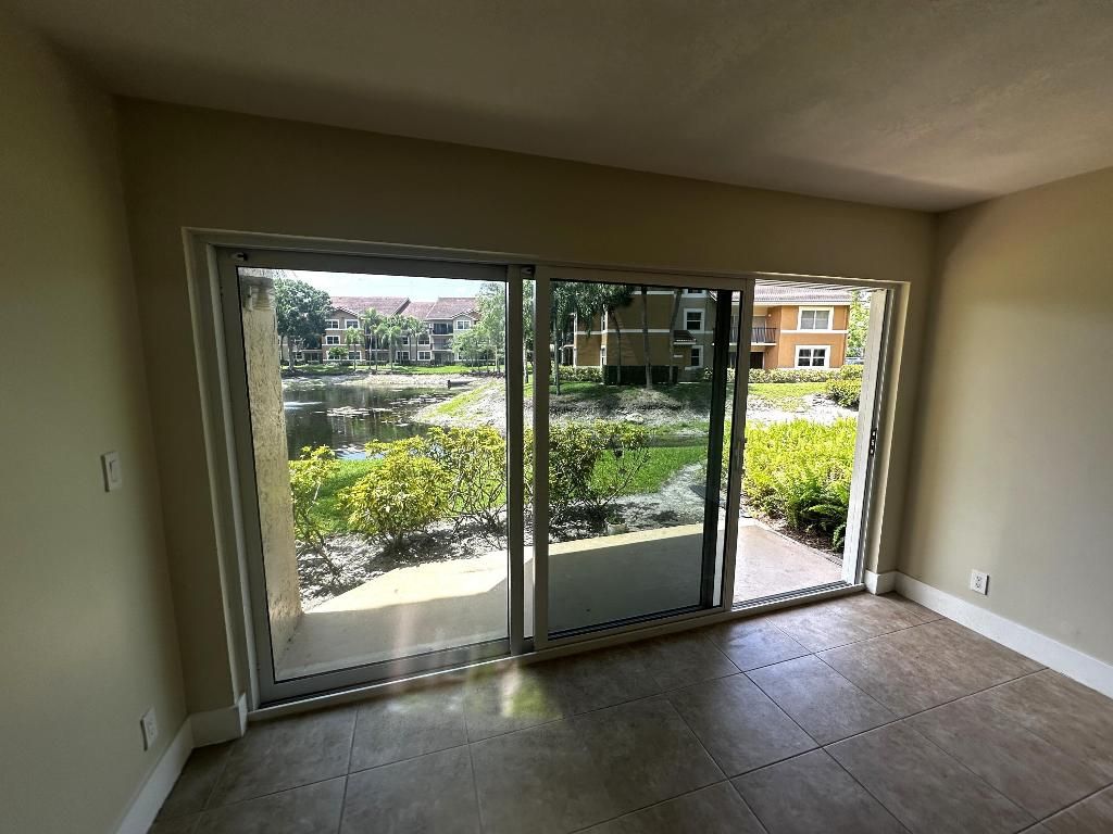 Photo of 8955 Wiles Rd #102, Coral Springs, FL 33067 (MLS # R11097382)