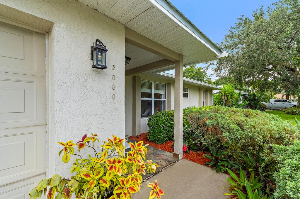 Photo of 2060 NE Hoya Calle, Jensen Beach, FL 34957 (MLS # R11108185)