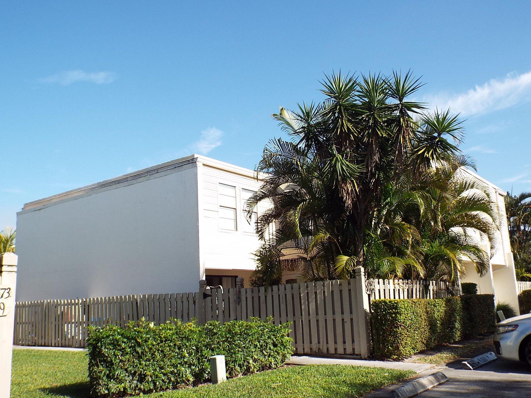 Spacious townhome with updated kitchen, granite countertops, new dishwasher and all tiled downstairs. Wood laminate flooring upstairs. Huge courtyard patio with privacy fence. 2 assigned parking spaces.Large primary bedroom with walk in closet and large walk in shower. Convenient central location. ''A'' rated schools