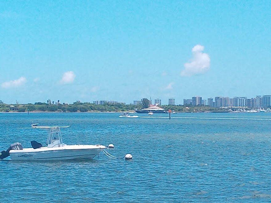 Property is available starting March 11, 2026 Water, Water, Water. Breathtaking view of Palm Beach Island, Singer Island and Peanut Island. Open Floor plan, light and bright, a true contemporary feel. this private oasis features 3br's, 2 ba's, that can be enjoyed as guest suites, office or den. Endless opportunities! Bask on the breezy terrace while enjoying a gorgeous sunset! Private master with en-suite bath and walk in closet. RESORT LIKE amenities include a fully equipped gym, waterfront pool, billiards room and 24-hr security, private parking, day dock beachside, BBQ & Tiki Hut. Only building in Palm Beach County  with private beach. Come experience this hidden jewel!