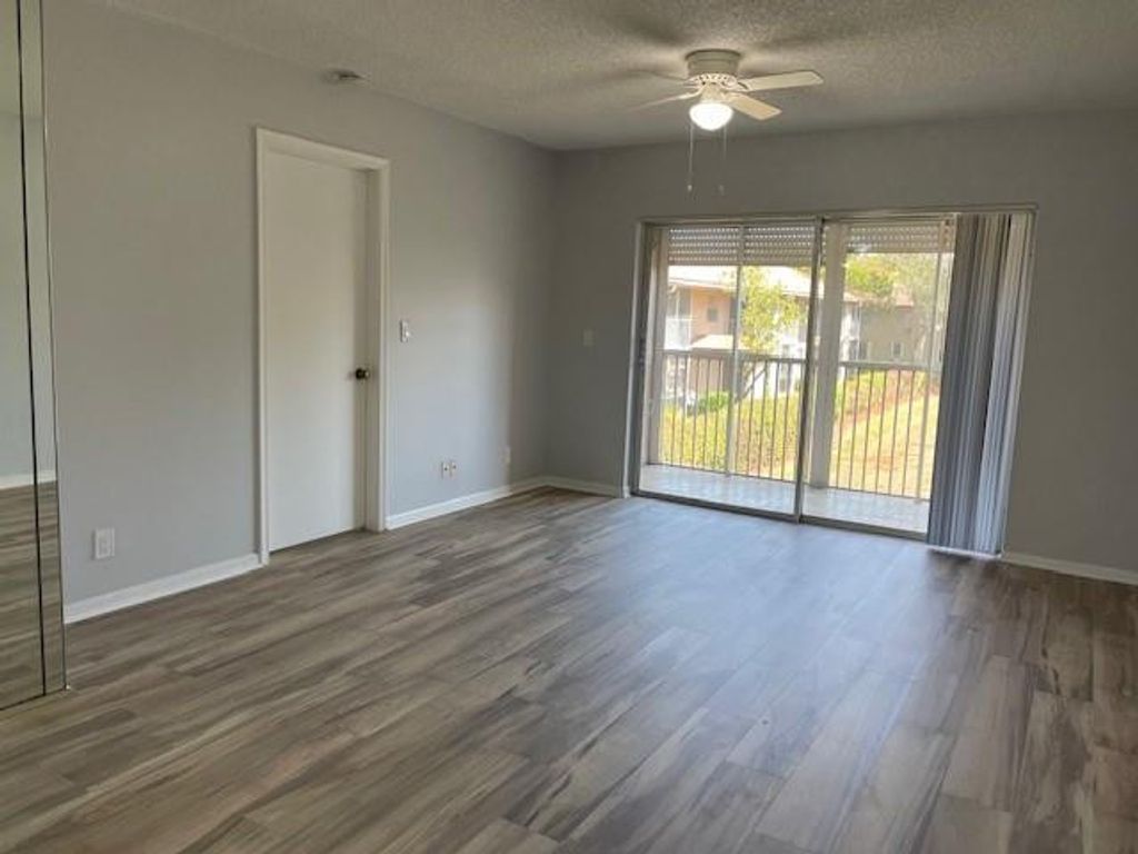 Photo of 8850 Royal Palm Boulevard #203, Coral Springs, FL 33065 (MLS # F10554253)