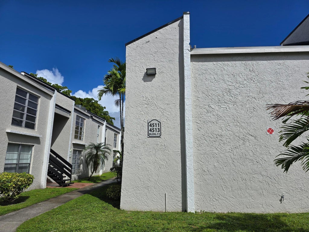 Photo of 4511 Treehouse Lane #E, Tamarac, FL 33319 (MLS # B26094198)