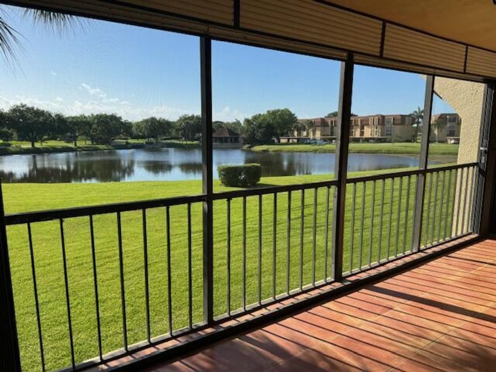 Photo of 5380 Woodland Lakes Drive #219, Palm Beach Gardens, FL 33418 (MLS # R10973360)