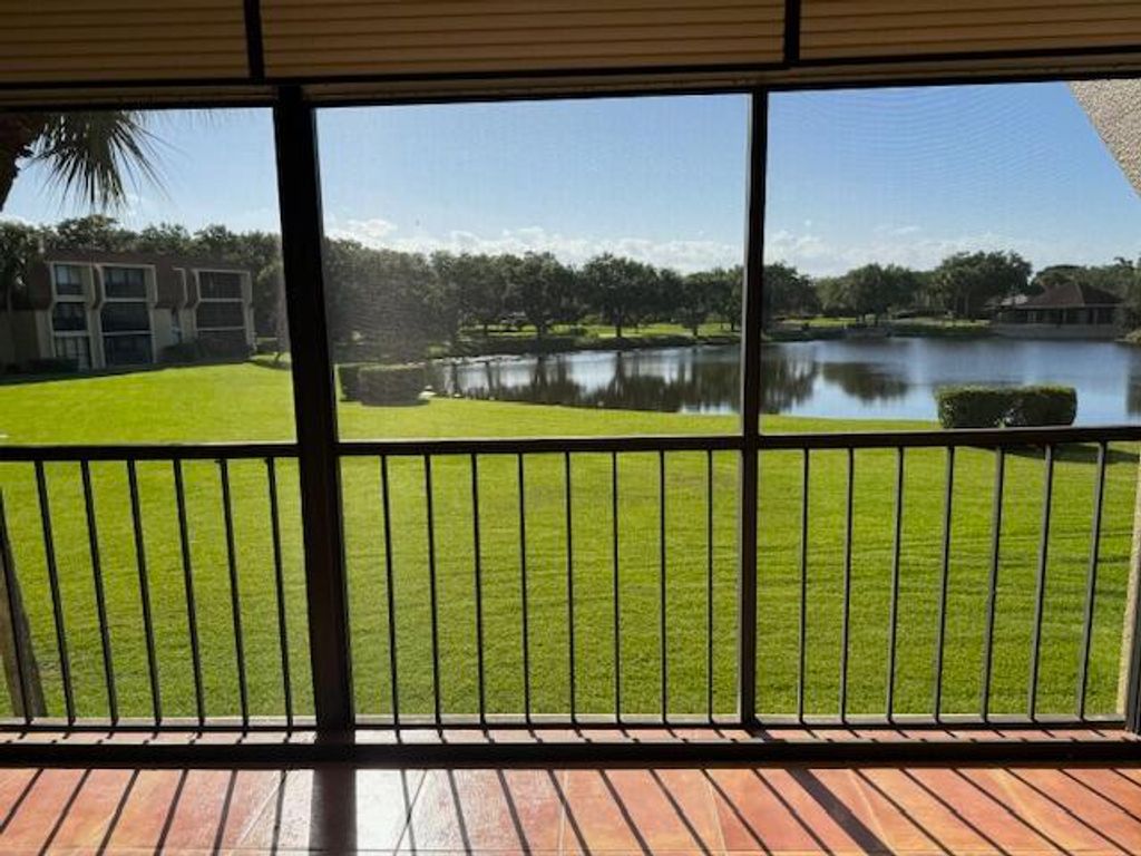Photo of 5380 Woodland Lakes Drive #219, Palm Beach Gardens, FL 33418 (MLS # R10973360)