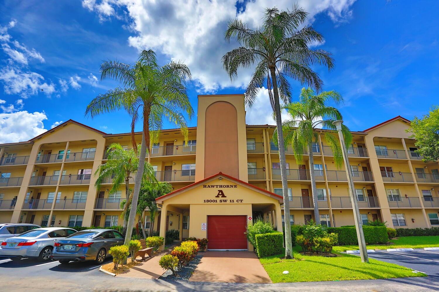 Welcome to your dream paradise retirement retreat!
Beautifully updated condo in one of South Florida’s most secure, amenity-rich communities. Features new wood flooring, modern doors and handles, updated ceiling fans, and a renovated master bath with sleek vanity and walk-in closet. Guest bath also updated.
Enjoy lake views from your balcony with plenty of natural lighting and shutters. Solid block construction plus assigned parking next to the building. Community includes 24-hour guarded security, on-site police/fire services, a convenience store, medical offices, café, and restaurant. Amenities include a private golf course, indoor/outdoor pools with jacuzzi, and a world-class clubhouse with year-round shows and activities. Live the retirement lifestyle you’ve dreamed of!