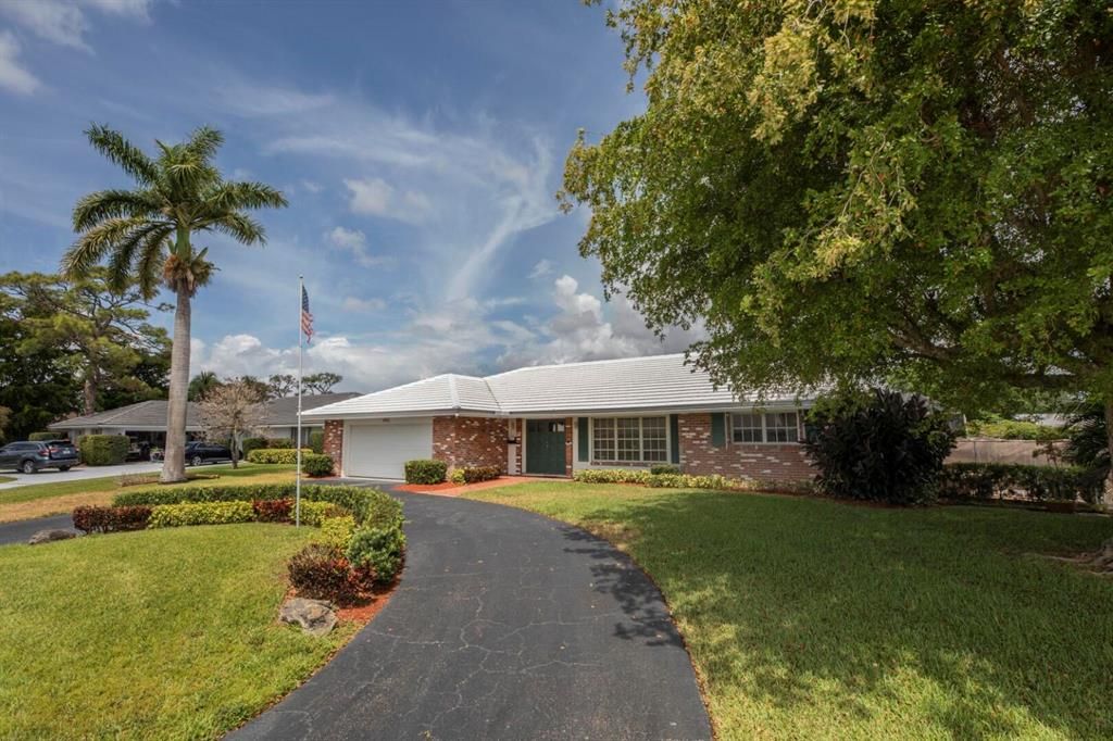 Photo of 444 Muirfield Drive, Atlantis, FL 33462 (MLS # R10705463)