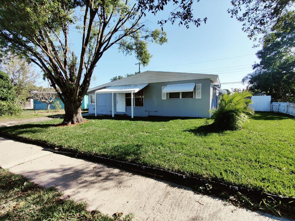 Photo of 456 Tuskegee Drive Dr, Lake Worth Beach, FL 33462 (MLS # R10780514)