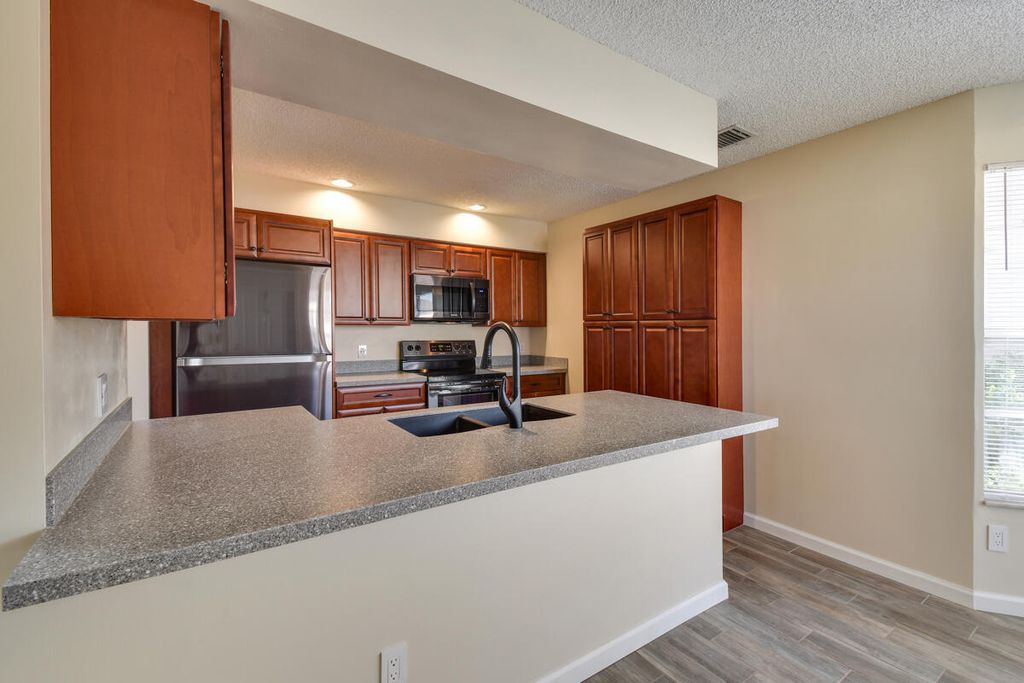 Photo of 1475 Lake Mango Way, West Palm Beach, FL 33406 (MLS # B26021889)