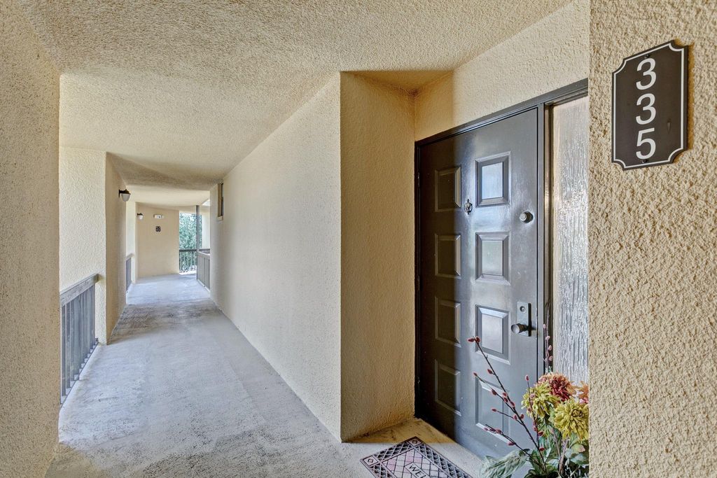 Photo of 5188 Woodland Lakes Drive #335, Palm Beach Gardens, FL 33418 (MLS # R10878543)
