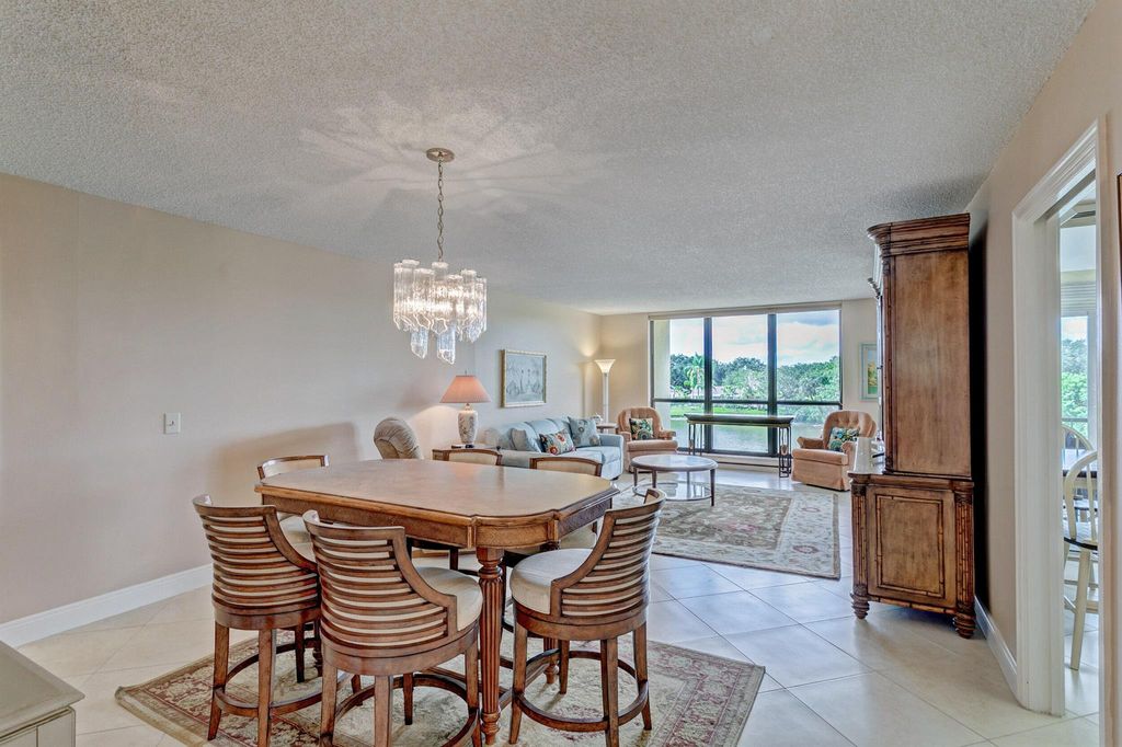 Photo of 5188 Woodland Lakes Drive #335, Palm Beach Gardens, FL 33418 (MLS # R10878543)