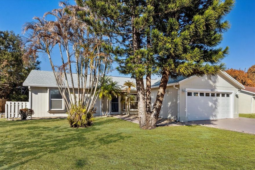 Welcome to the charming Lyngate neighborhood in Port St. Lucie! This home is perfectly situated with top-rated elementary and middle schools just a short walk away. Enjoy the excitement of the Atlantic Ocean and Jensen Beach just 6.8 miles away!The interior of the home has been upgraded and includes fresh paint throughout using high-quality Sherwin-Williams Duration in Dover White, luxury vinyl plank flooring with new baseboards, and updated bathroom vanities, faucets, shower heads, toilets, and lighting fixtures. All new light switches and receptacles throughout the home, and the front entry door features a smart keypad lock. There is also a Rheem Performance 50-gallon, 4500-watt electric water heater with a six-year warranty. Exterior upgrades include a new roof with GAF Timberline HDZ lifetime shingles installed in November 2025, upgraded east-side exterior siding with durable Hardie® fiber cement panels, and a full exterior repaint using high-quality Sherwin-Williams Duration paint. Additional enhancements include outdoor light fixtures with a dusk-to-dawn feature, a wind-code-compliant garage door with windows and a smart Genie opener, a JELD-WEN premium vinyl garage window, a Speck 1.5-horsepower pool pump with timer, and a new main electrical panel and breakers.Additional features include a sprinkler system, hardwired security alarm system with smoke detectors, window sensors, and motion detectors, hurricane shutters for all windows and the sliding patio door, two outdoor storage sheds, privacy fence