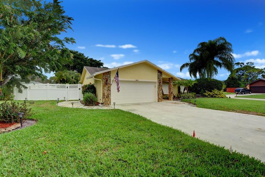 BEAUTIFULLY APPOINTED RANCH ON A CORNER LOT WITH 3 BEDROOMS AND 2 BATHS IN LA MANCHA WHERE THERE IS NO HOA FEES. ALL ROOMS HAVE BEEN UPDATED WITH WOOD-LAMINATE FLOORING, DECORATIVE OVERSIZED BASEBOARDS AND FRESH PAINT JUST TO MENTION A FEW. THE HURRICANE IMPACT WINDOW AND DOORS WERE ADDED IN 2016 ALONG WITH EXTRA ALUMINIUM PLANTATION SHUTTERS ON THE OUTSIDE OF THE FRONT WINDOWS FOR BEAUTY AND EFFICIENCY. CUSTOM WOODEN PLANTATION SHUTTERS ON ALL INTERIOR WINDOWS WELCOME YOU AS YOU ENTER THE FOYER OF THE HOME. THE OVERSIZED GALLEY KITCHEN HAS SOLID WOOD CABINETRY WITH GRANITE COUNTER TOPS AND HIGH-HAT LIGHTING. THE ENTIRE KITCHEN HAS UNDER CABINET LIGHTING AND EXTRA POWER SOURCE SO NOT TO INTERRUPT THE SEAMLESS GRANITE BACKSPLASH. THE BREAKFAST NOOK HAS A DESK/STUDY AREA THAT MATCHES THE KITCHEN AND PROVIDES A QUAINT PLACE FOR MORNING COFFEE WHILE LOOKING OVER THE POOL. THE GREAT-ROOM IS JUST THAT TO INCLUDE ROOM FOR A LARGE DINING ROOM TABLE FOR FAMILY GATHERINS.  ALL BEDROOMS ARE PDATED WITH BUILT-CABINETRY AND/OR CUSTOMIZED CLOSETS FOR MAXIMUM STORAGE. THE SPARE BATHROOM WITH TUB HAS BEEN UGRADED WITH SOLID WOOD CABINETS, TILED THROUGHOUT AND OVERSIZED VANITY. THE MASTER SUITE OASIS HAS UNIQUE LAMINATE WOOD PLANK FLOORING, A WALK- IN- CLOSET FIT FOR A QUEEN AND MASTER BATH THAT HAS BEEN COMPLETELY REMODELED WITH REGULAR AND RAIN SHOWER-HEADS.  THE BACK PORCH IS THE ENTIRE LENGTH OF THE HOME AND HAS SLIDER ACCESS TO THE GREAT ROOM AND MASTER BEDROOM WITH SERENE VIEW OF THE POOL AND PERGOLA. TRAVERTINE PAVERS COMPLETE THE UPGRADED POOL (2017) AND YARD IS SURROUNDED BY A WHITE PVC FENCE FOR PRIVACY AND BEAUTY. THE OVERSIZED TWO CAR GARAGE PROVIDES A WORK BENCH, STORAGE, TANKLESS WATER HEATER (2018) STACKABLE WASHER/DRYER (2016) AND AUTO GARAGE DOOR OPENER. THIS IS A MUST SEE BEAUTY.