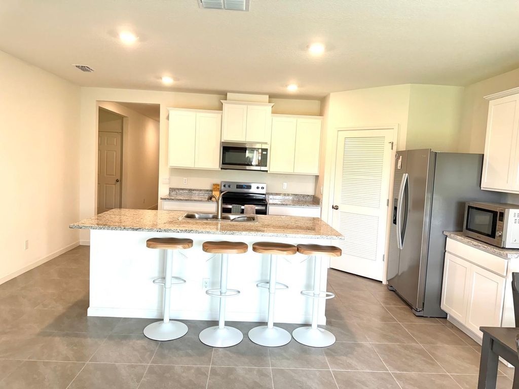 Photo of 443 Seafoam Circle, Fort Pierce, FL 34945 (MLS # R11075194)