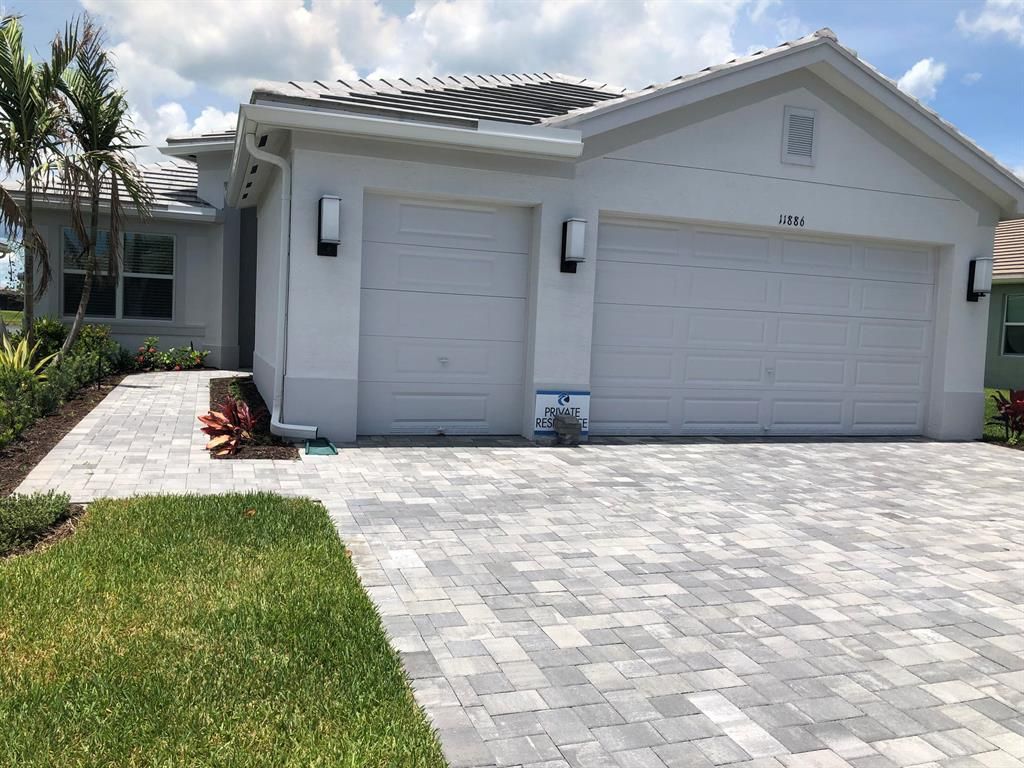 Photo of 11886 SW Poseidon Way, Port St Lucie, FL 34987 (MLS # R10880736)