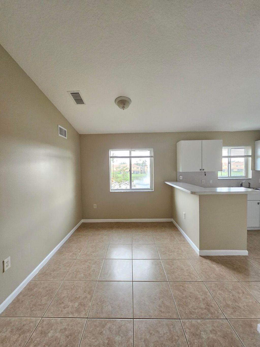 Photo of 3490 Briar Bay Boulevard #206, West Palm Beach, FL 33411 (MLS # B26026838)