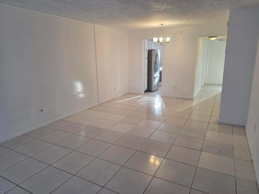 Photo of 661 N UNIVERSITY Drive #1-104, Pembroke Pines, FL 33024 (MLS # B26058112)