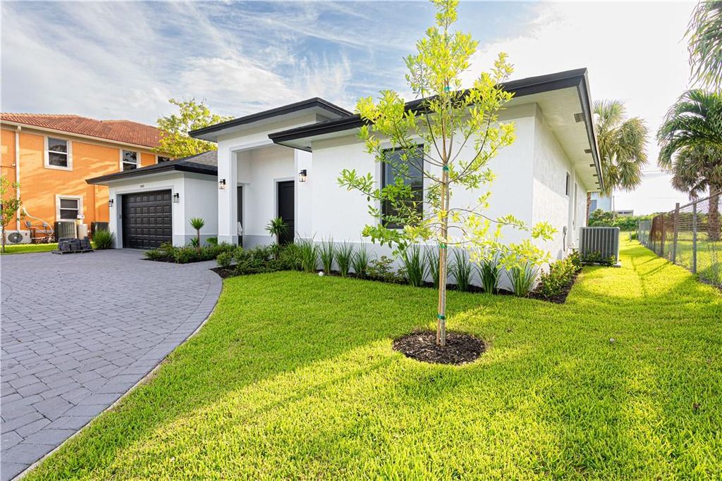 Photo of 1491 N Mangonia Cir, West Palm Beach, FL 33401 (MLS # F10385268)