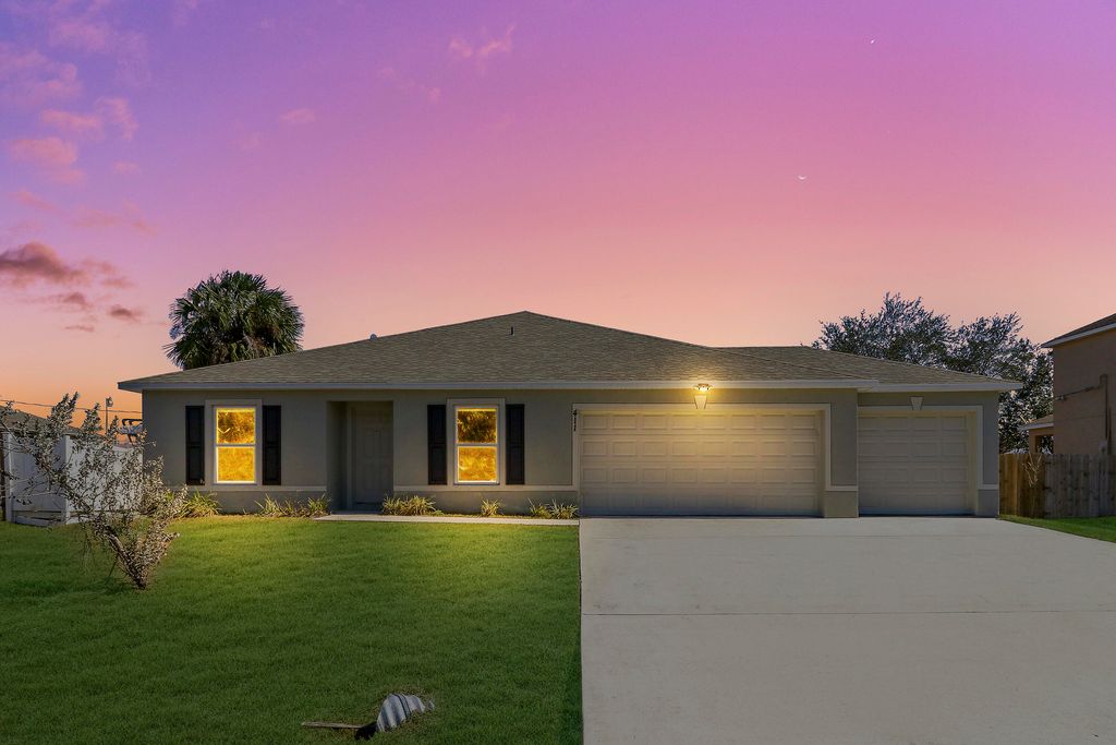 Photo of 411 SW Doreen Street, Port Saint Lucie, FL 34953 (MLS # R11163245)